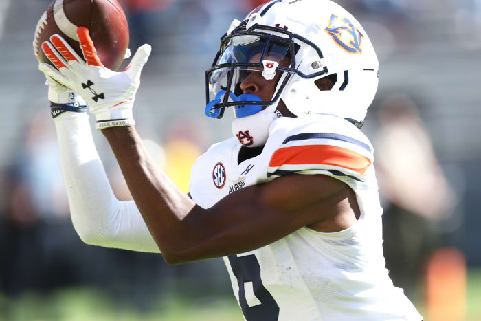 Oct 16, 2021; Fayetteville, Arkansas, USA; Auburn Tigers wide receiver Ja'Varrius Johnson (6) catches a pass for touchdown in the first quarter against the Arkansas Razorbacks at Donald W. Reynolds Razorback Stadium. Mandatory Credit: Nelson Chenault-USA TODAY Sports